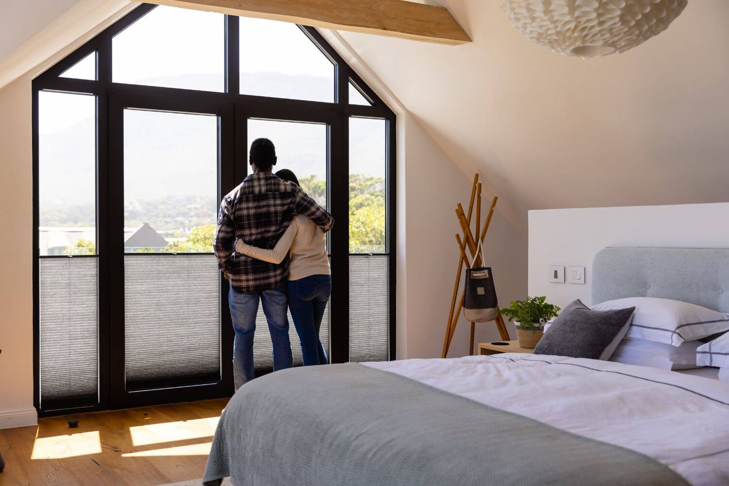 couple enjoying smart blinds